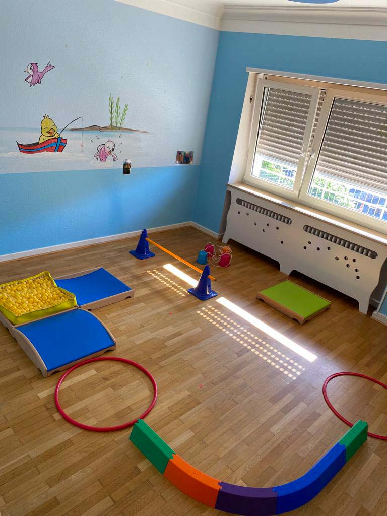 Reading and early-learning corner at Le Pays Imaginaire Soleuvre nursery